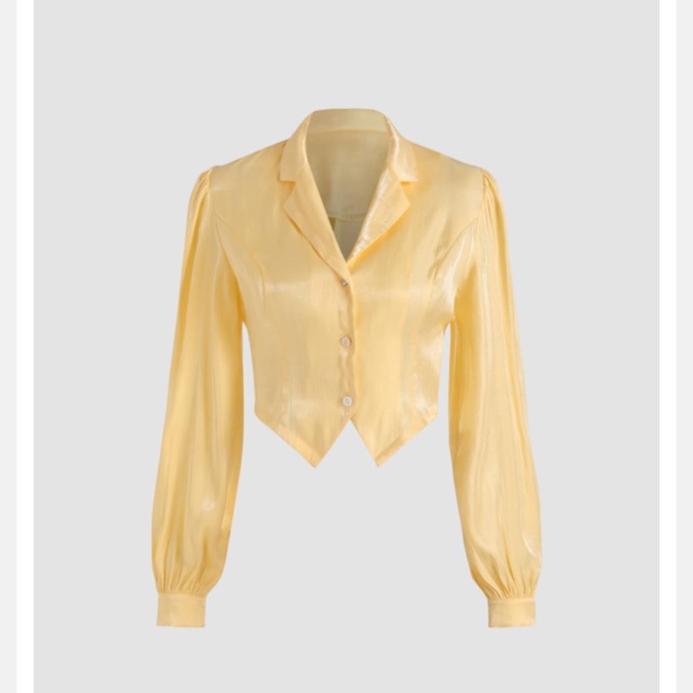 Yellow buttoned crop top.